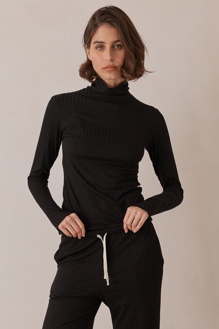 חולצת גולף קאיה שרוולי כפפה | שחור