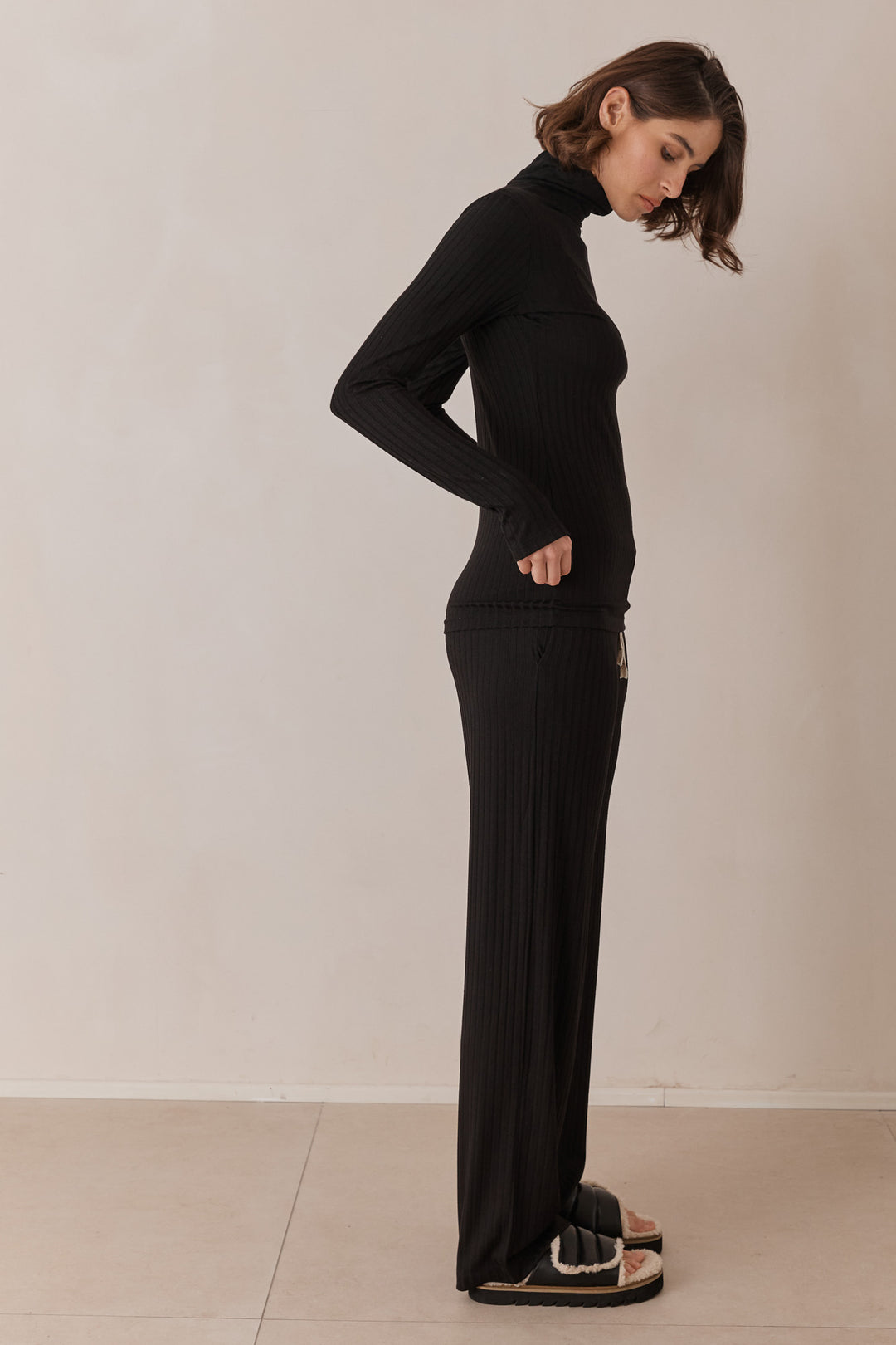 חולצת גולף קאיה שרוולי כפפה | שחור