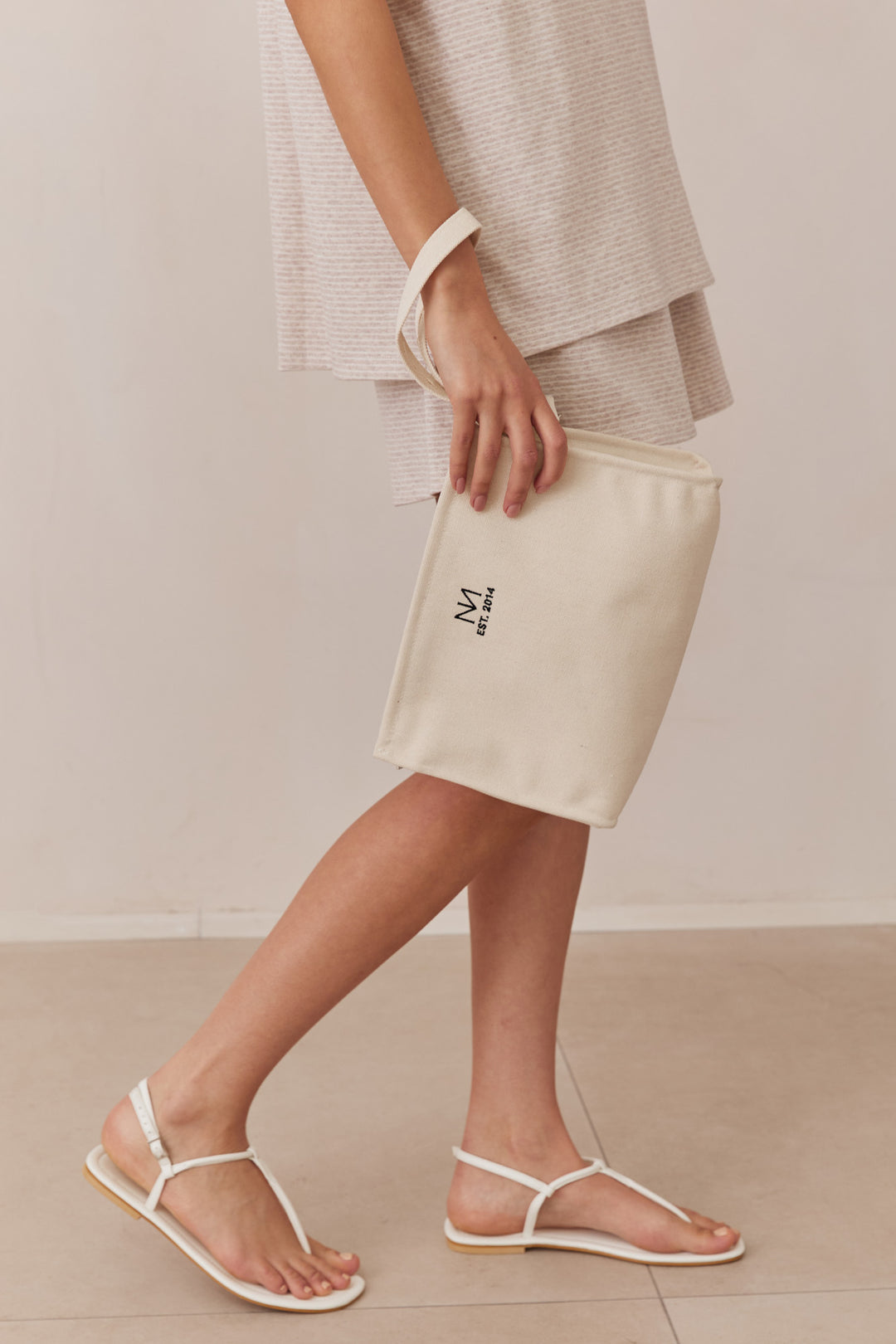 קלאץ' קנבס נורי בשילוב לוגו | קרם