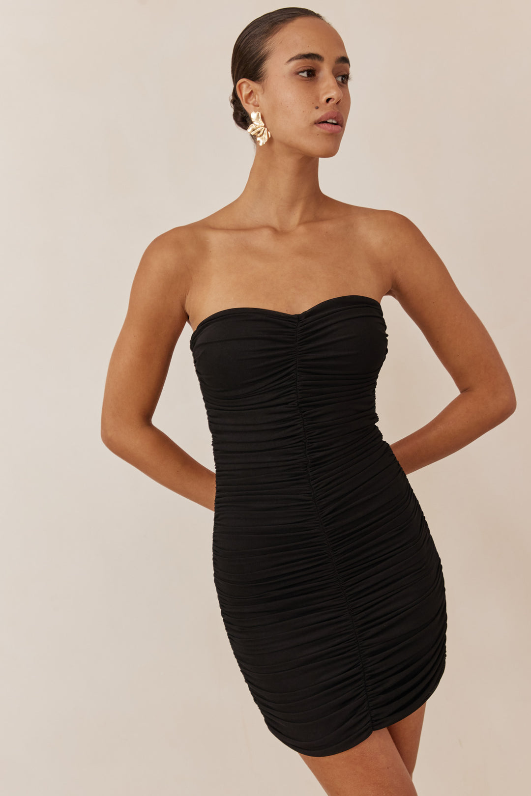 זוג עגילי חצי פרח מוזהב | זהב