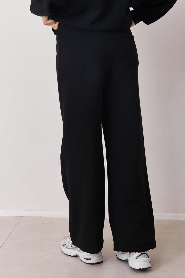 מכנסי פוטר סאם גזרה רחבה | שחור