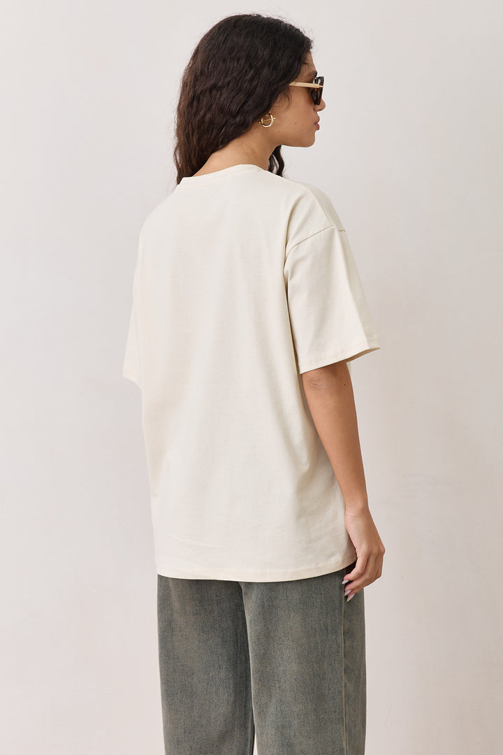 טי שירט PARADISE צווארון ניקי | בז'