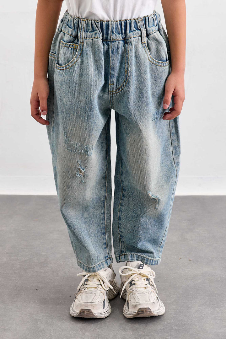 מכנסי ג'ינס משופשפים גומי במותן | ג'ינס