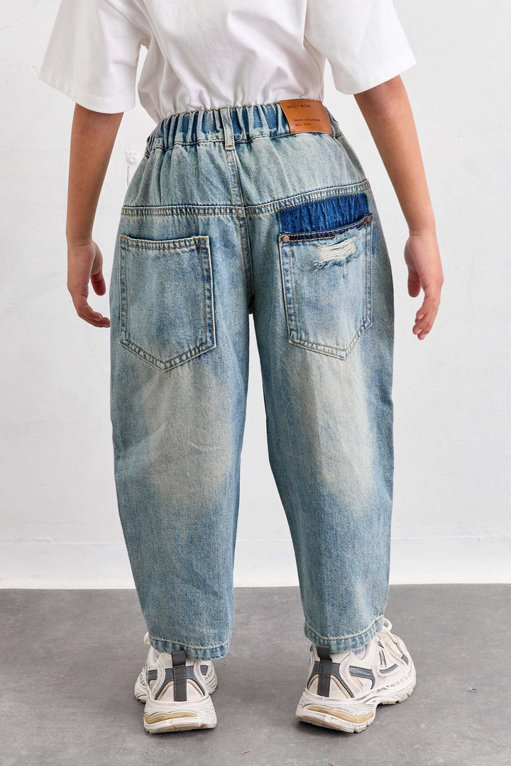 מכנסי ג'ינס משופשפים גומי במותן | ג'ינס