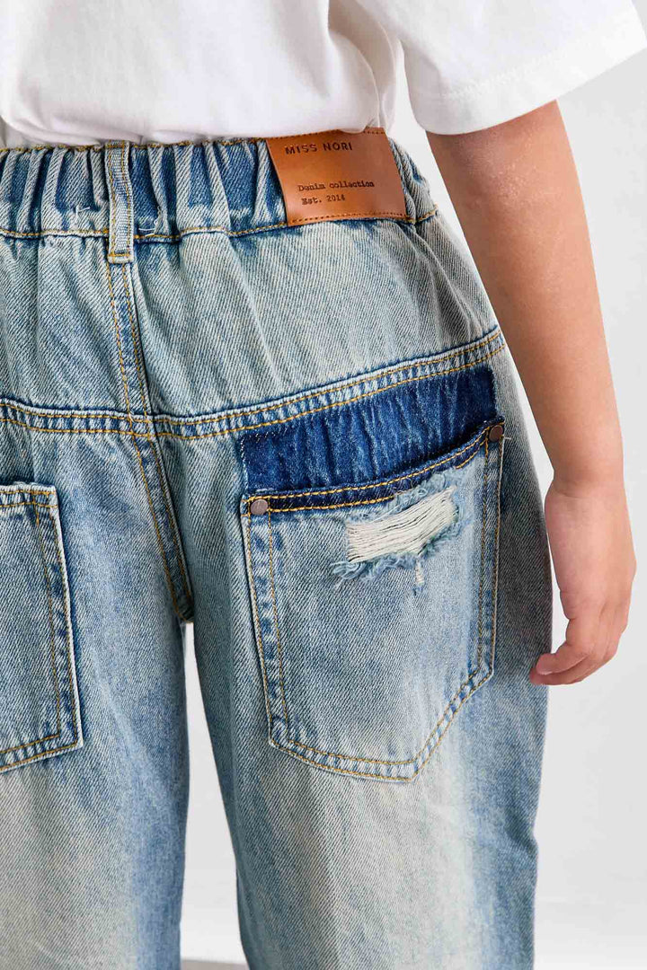 מכנסי ג'ינס משופשפים גומי במותן | ג'ינס