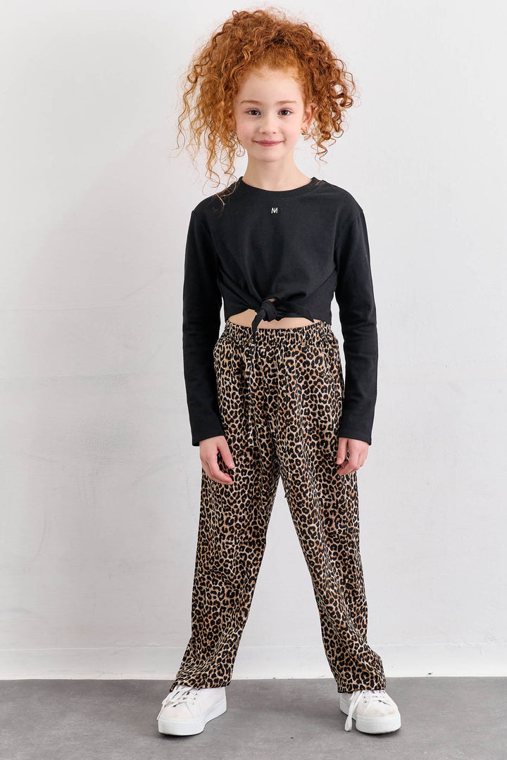 מכנסיים מנומרים בשילוב גומי במותן | מנומר