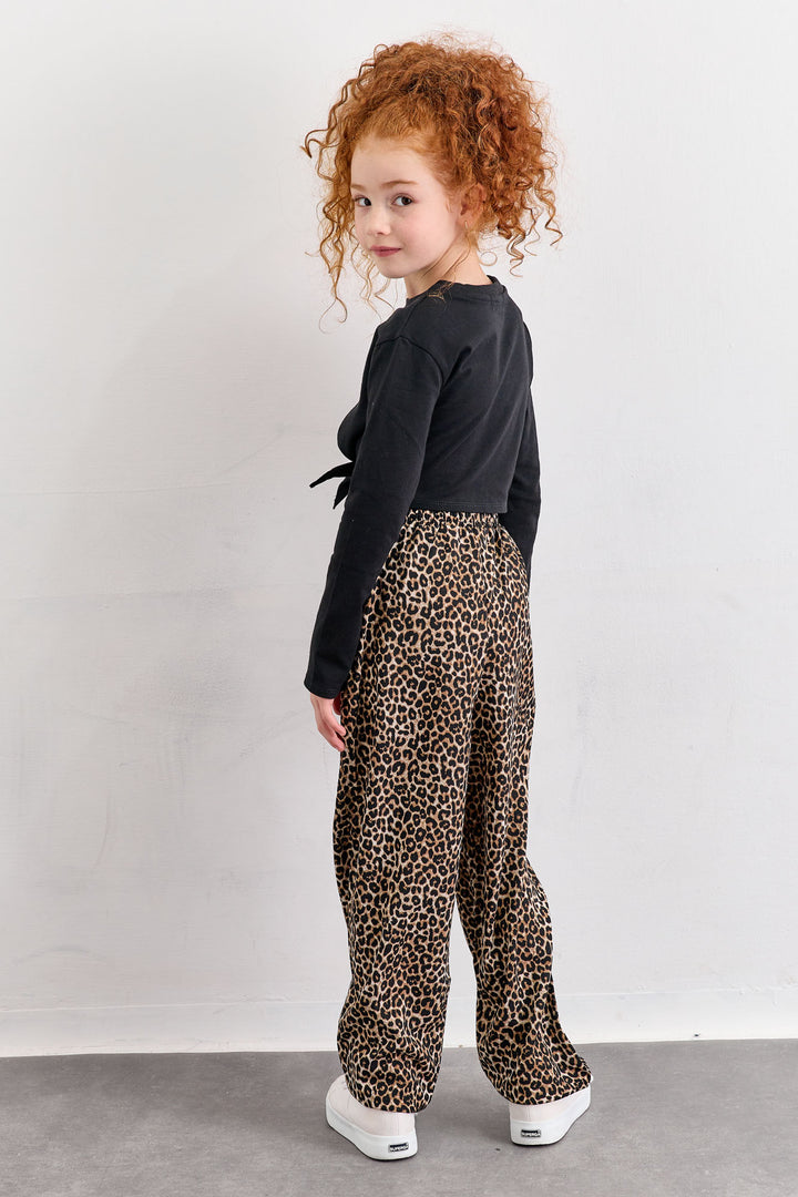 מכנסיים מנומרים בשילוב גומי במותן | מנומר