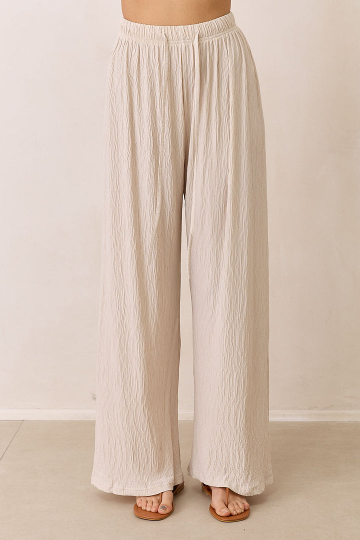 מכנסי פייר טקסטורת פסים | בז'