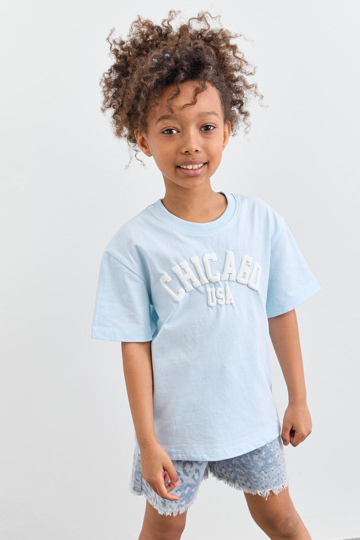 טי שירט CHICAGO בגזרת אוברסייז | תכלת