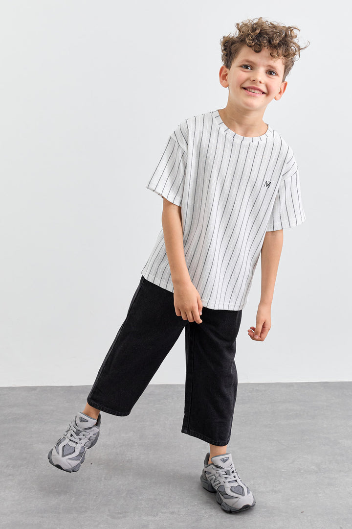 מכנסי ג'ינס בשילוב כיסים וגומי במותן | ג'ינס שחור