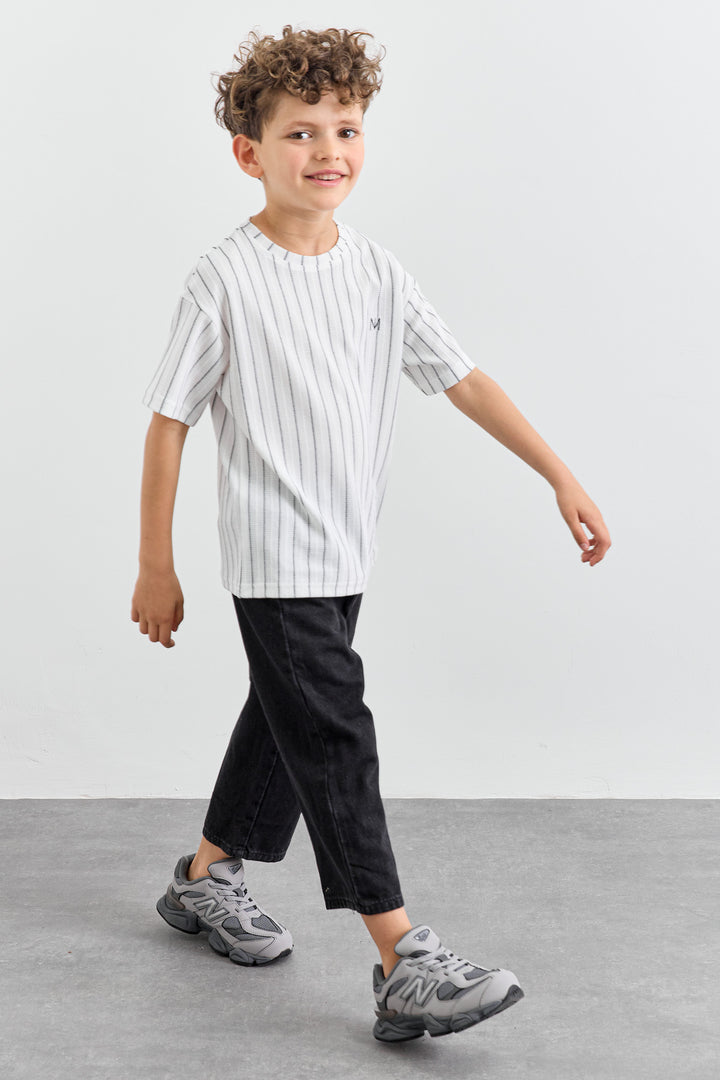 מכנסי ג'ינס בשילוב כיסים וגומי במותן | ג'ינס שחור