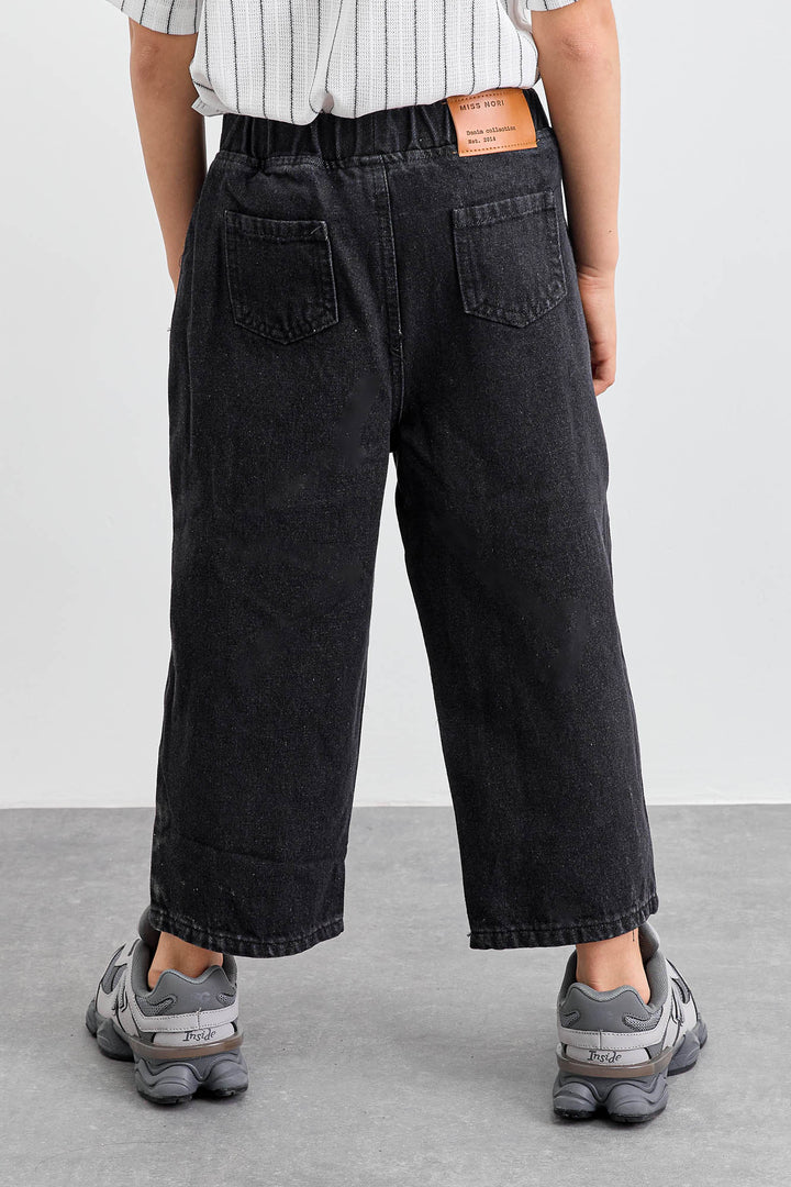 מכנסי ג'ינס בשילוב כיסים וגומי במותן | ג'ינס שחור