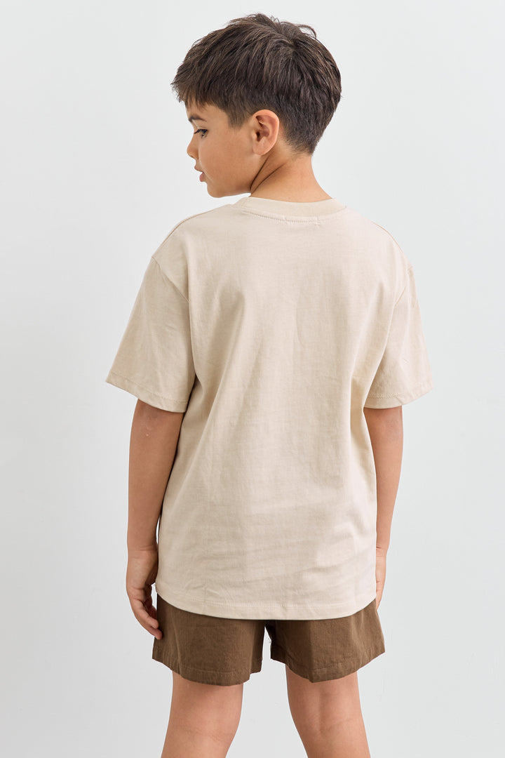 טי שירט WILD WEST גזרת אוברסייז | בז'