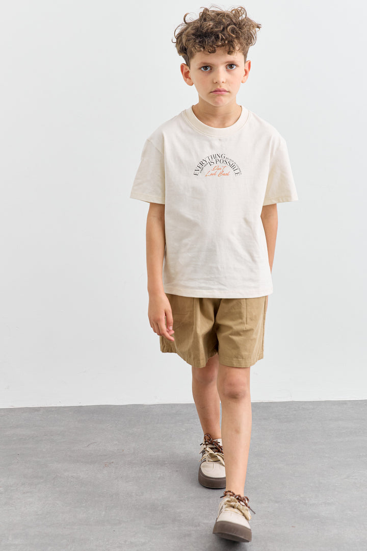 טי שירט Dont look back גזרת אוברסייז | קרם