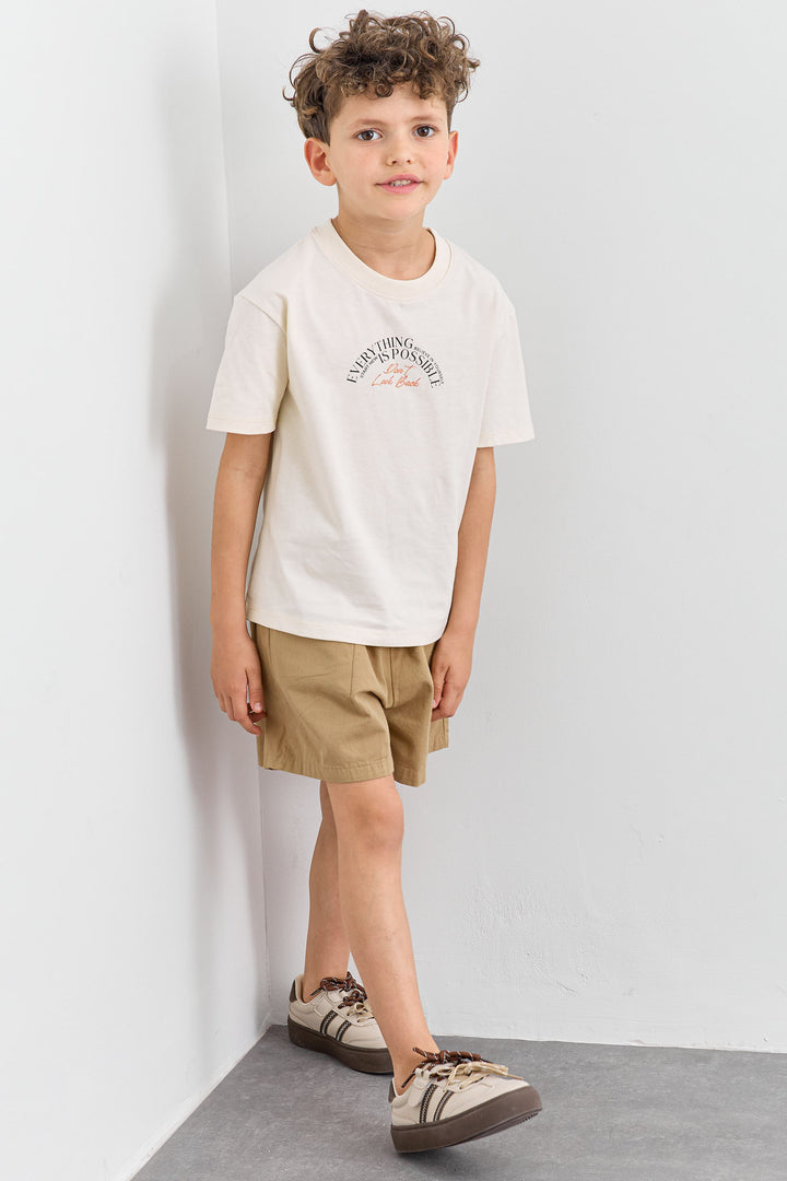 טי שירט Dont look back גזרת אוברסייז | קרם