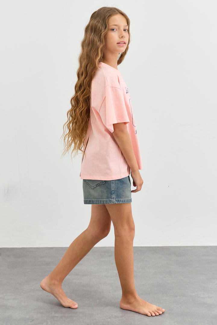 טי שירט אוברסייז עם הדפס ומפתח בגב | ורוד