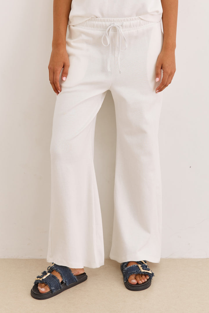 מכנסי אנוק סיומת גזורה | לבן