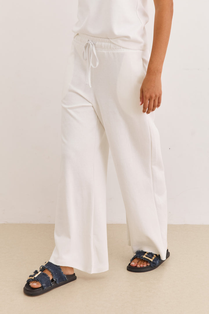 מכנסי אנוק סיומת גזורה | לבן