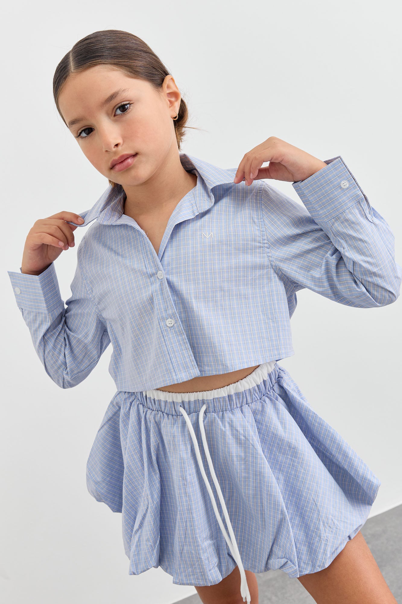 מכופתרת משבצות גזרת קרופ | כחול