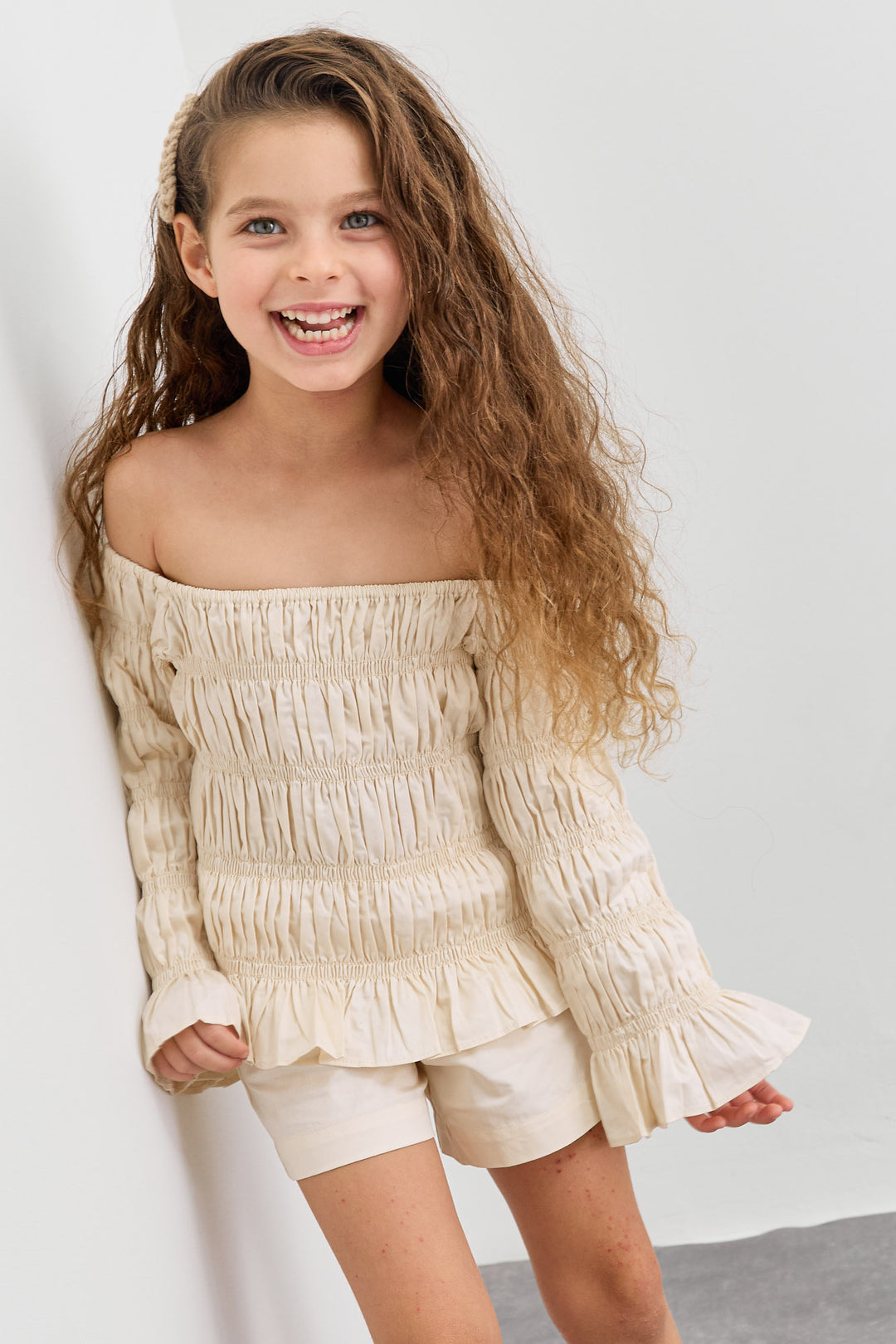 חליפת כיווצים טופ אוף שולדרס ושורטס | קרם