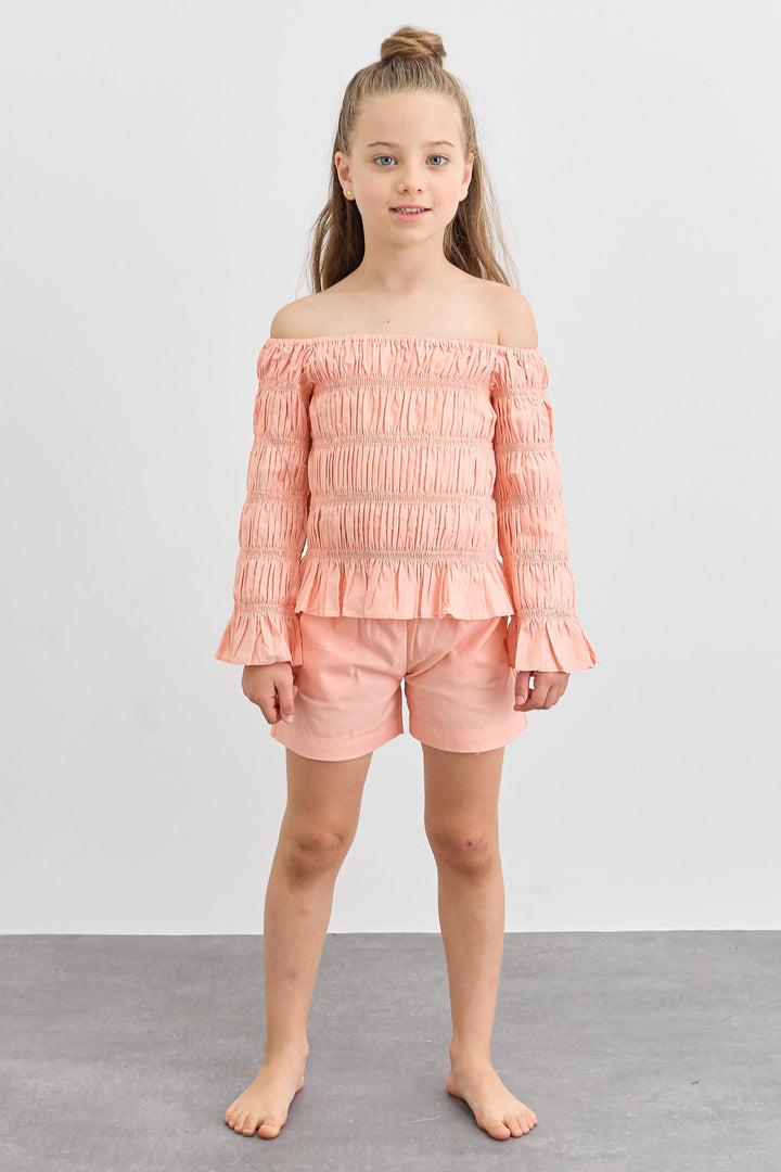 חליפת כיווצים טופ אוף שולדרס ושורטס | ורוד