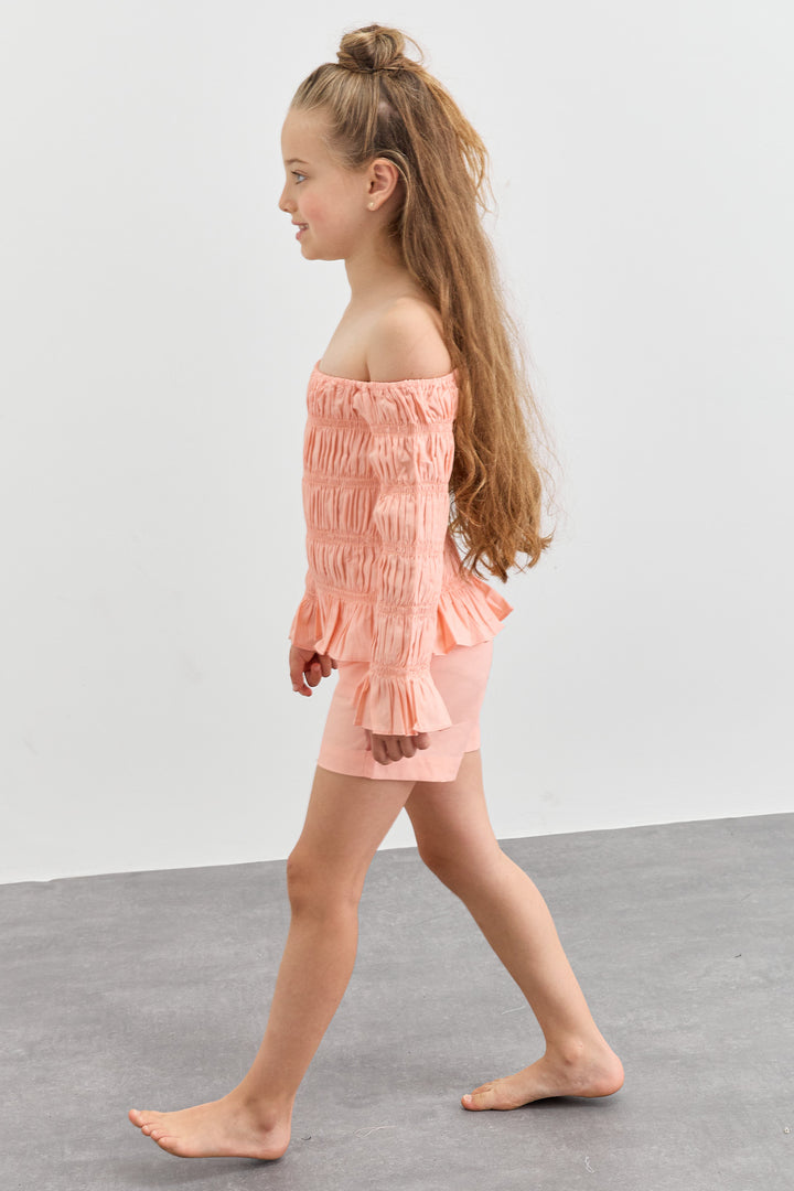 חליפת כיווצים טופ אוף שולדרס ושורטס | ורוד