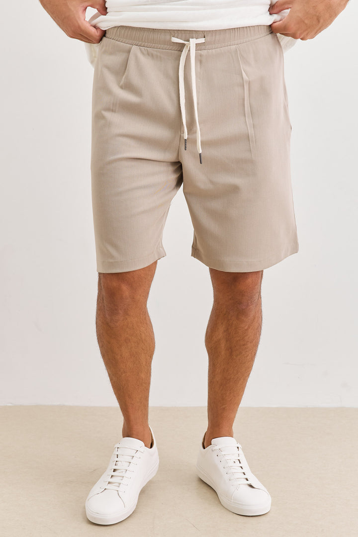 מכנסי ברמודה ג׳סטין מחויטים גומי במותן | בז'