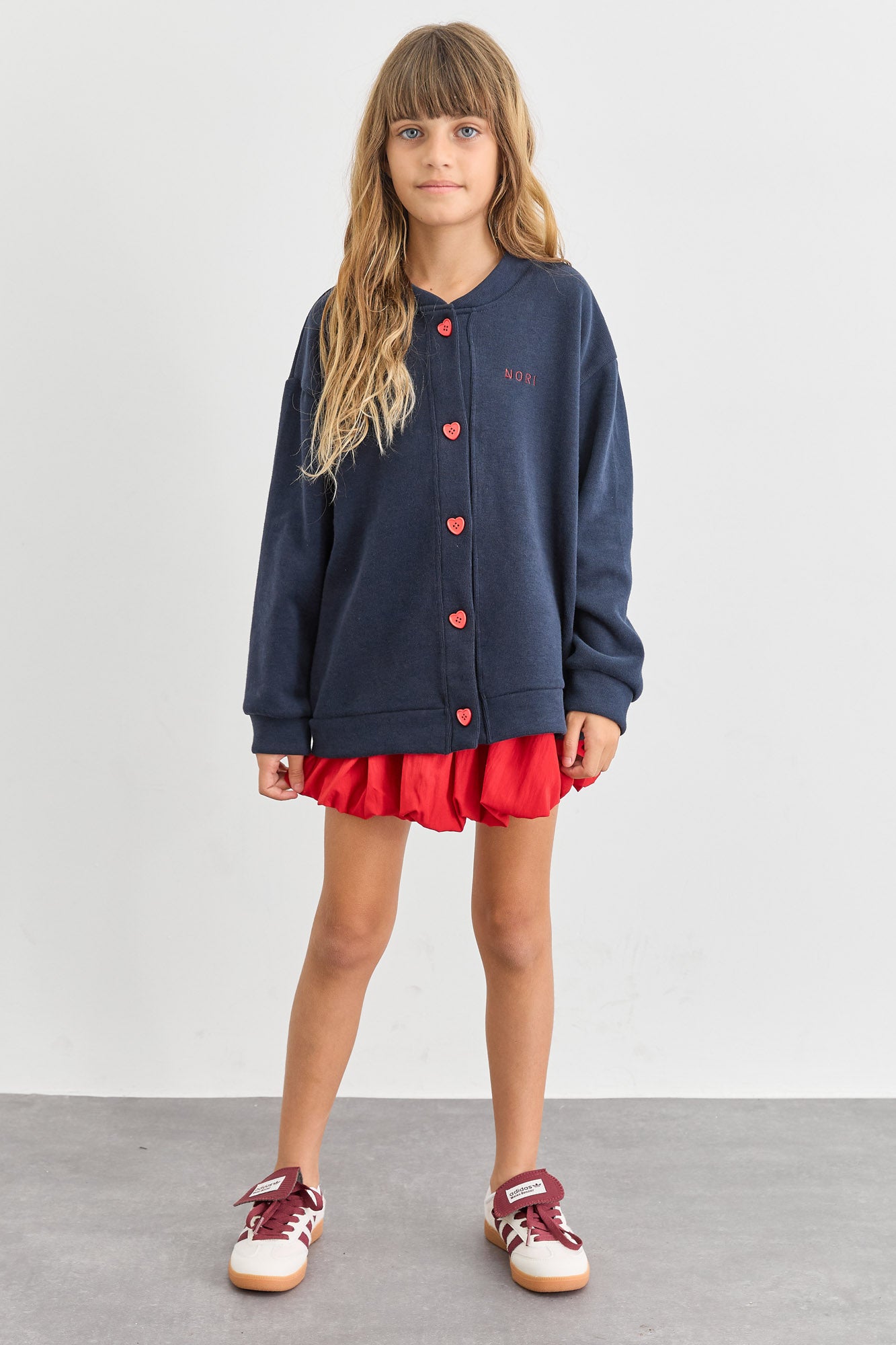 חצאית מיני בגזרת בלון מבד ניילון | אדום