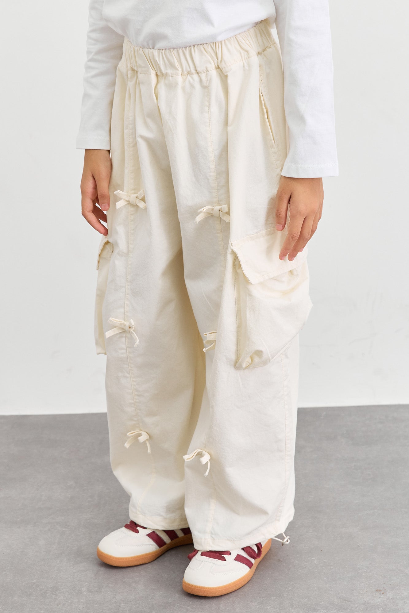 מכנסי דגמ"ח דיטיילז פפיונים וסיומת גומי | קרם