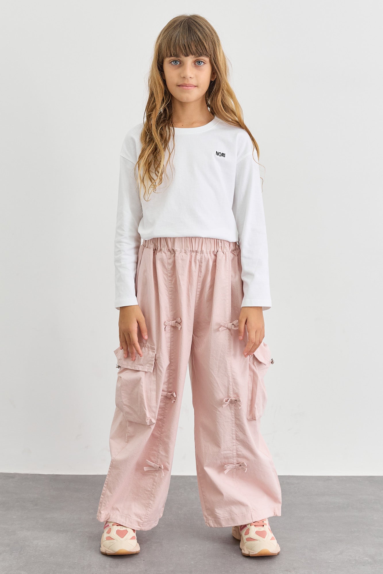 מכנסי דגמ"ח דיטיילז פפיונים וסיומת גומי | ורוד