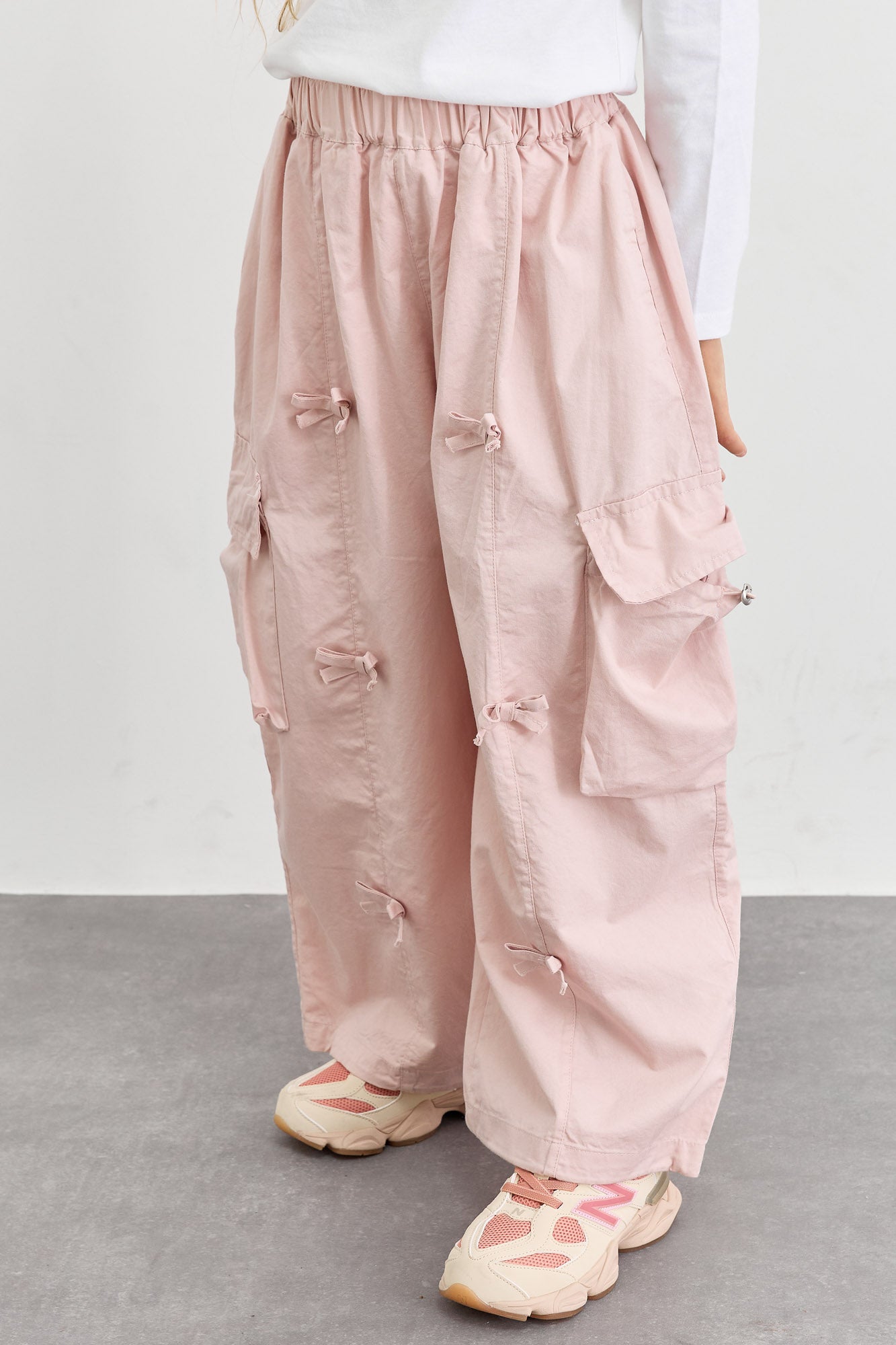 מכנסי דגמ"ח דיטיילז פפיונים וסיומת גומי | ורוד