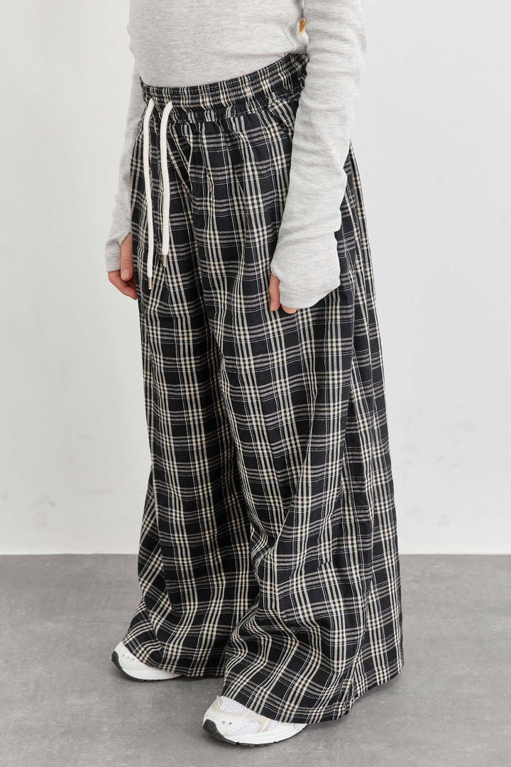 מכנסיים רחבים הדפס משבצות | שחור/לבן