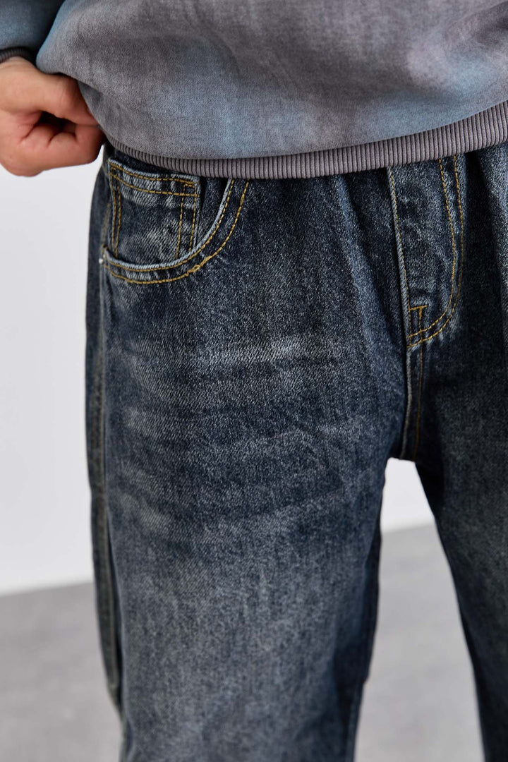 ג'ינס בגזרת בלון במראה משופשף | ג'ינס