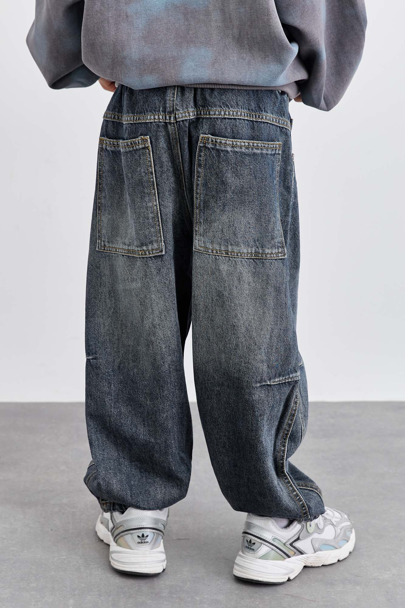 ג'ינס בגזרת בלון במראה משופשף | ג'ינס