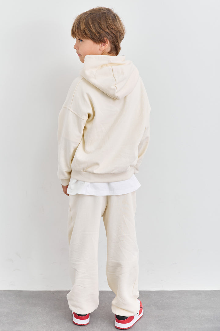 חליפת KIDS CLUB גזרת אוברסייז בשילוב רקמה | קרם