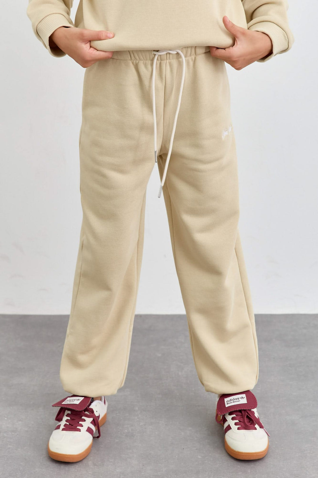 חליפה מבד פרנץ' טרי סווטשירט גולף עם רוכסן ומכנסי בלון | בז'