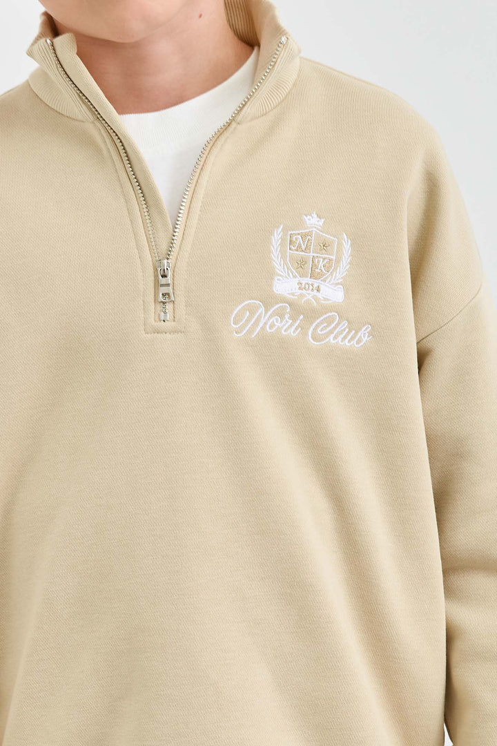 חליפה מבד פרנץ' טרי סווטשירט גולף עם רוכסן ומכנסי בלון | בז'