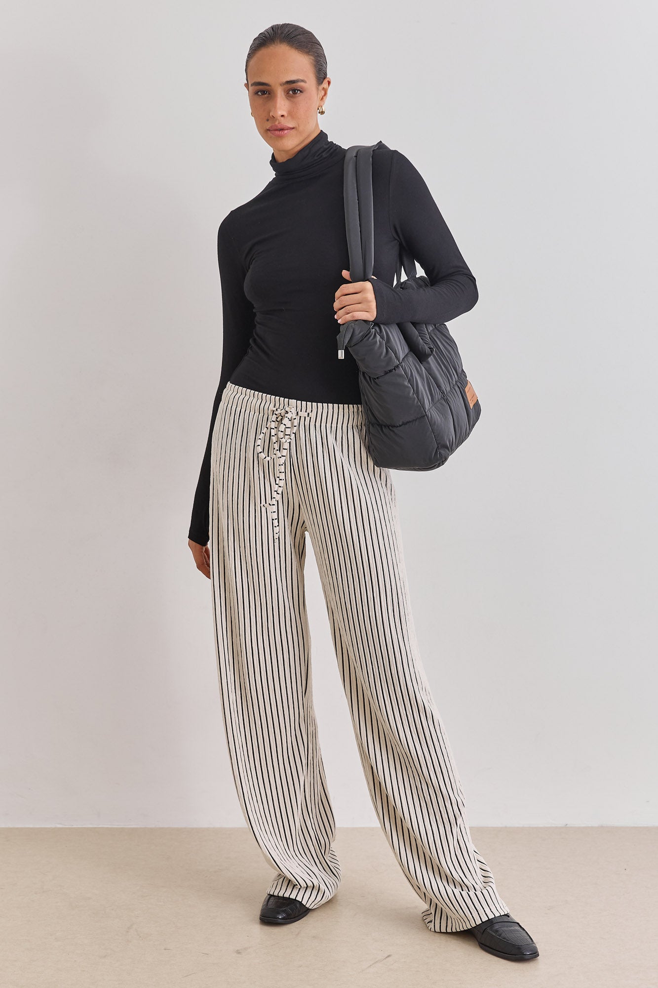 חולצת גולף רנה שרוולי כפפה | שחור