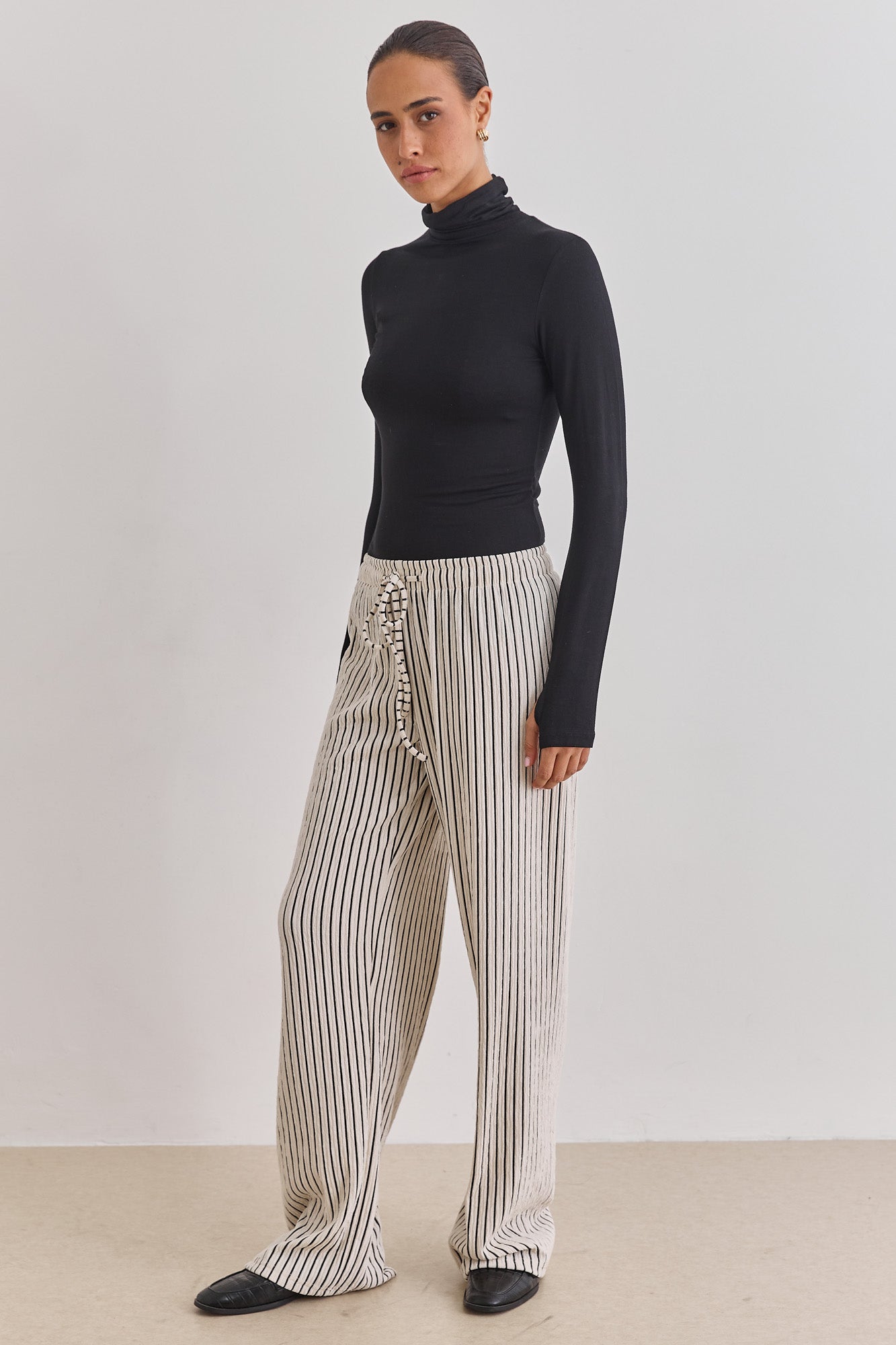 חולצת גולף רנה שרוולי כפפה | שחור