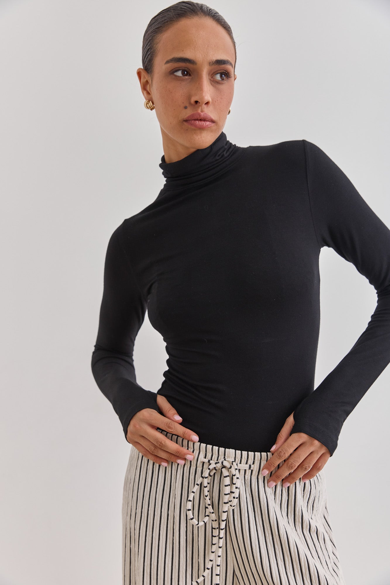 חולצת גולף רנה שרוולי כפפה | שחור