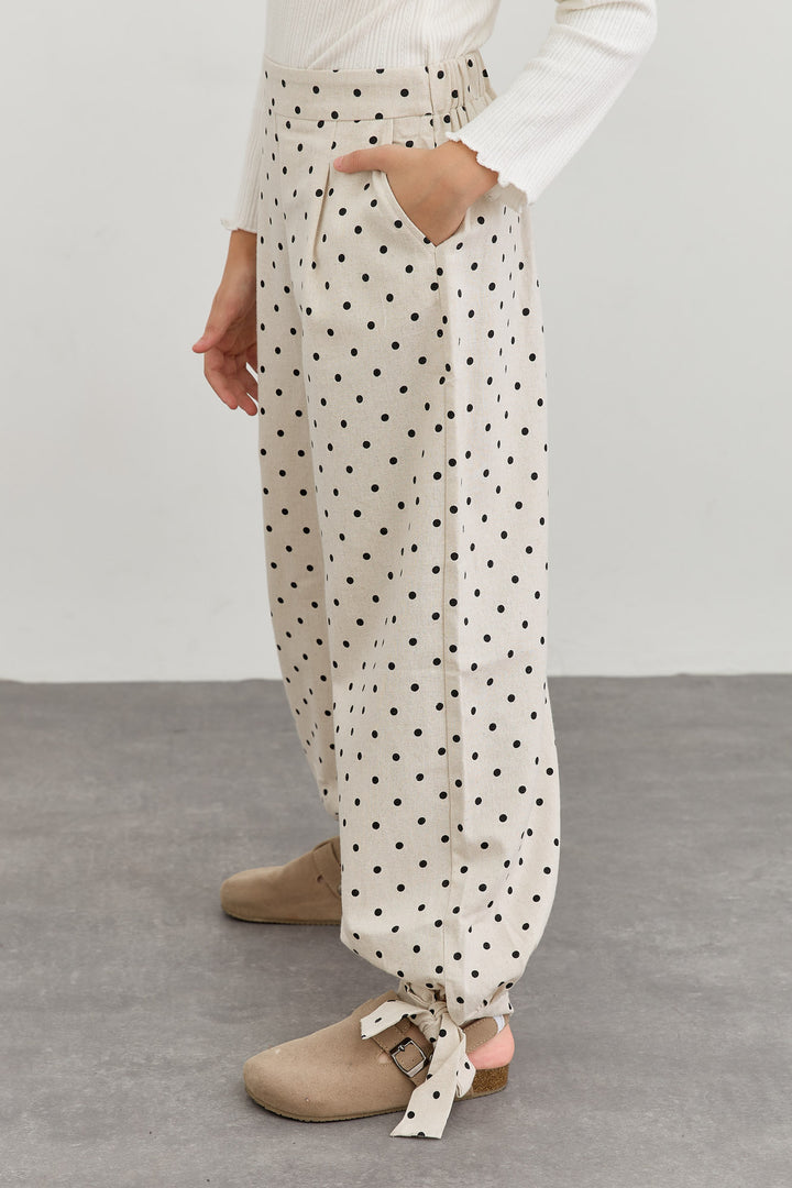 מכנסי בלון בגזרת אוברסייז פרינט נקודות | קרם