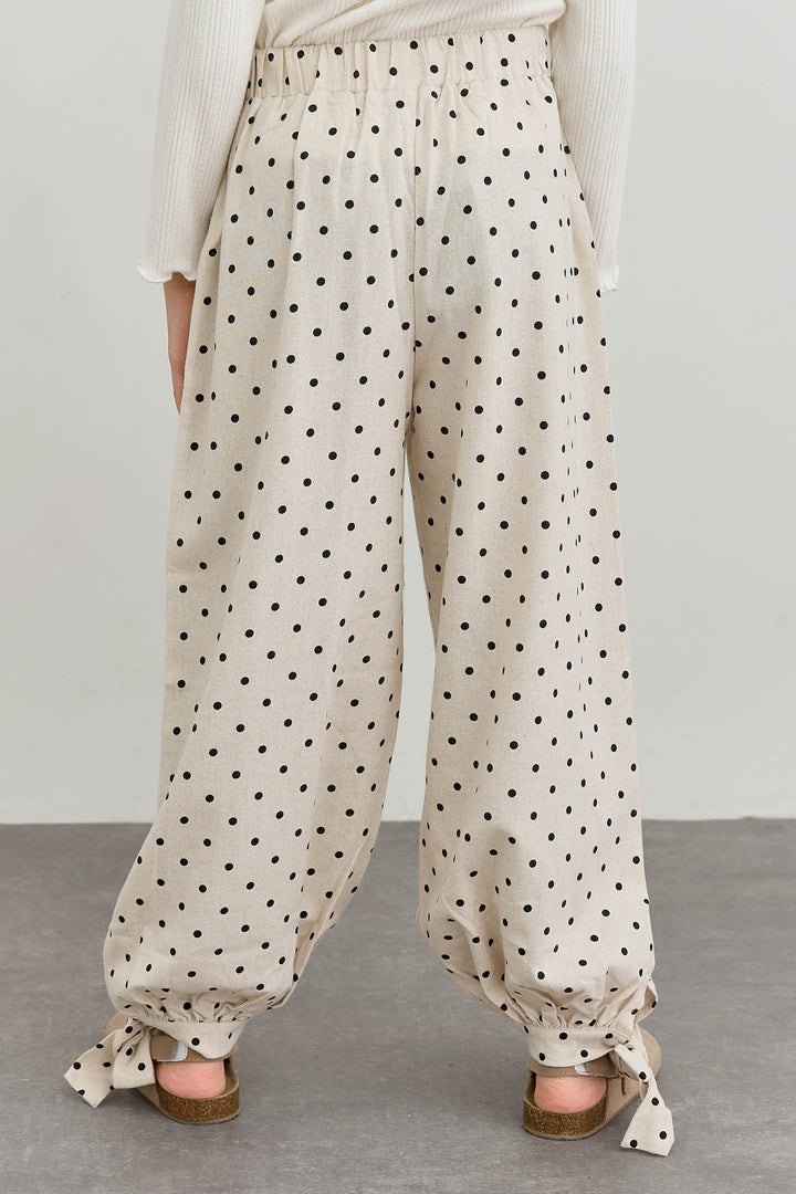 מכנסי בלון בגזרת אוברסייז פרינט נקודות | קרם